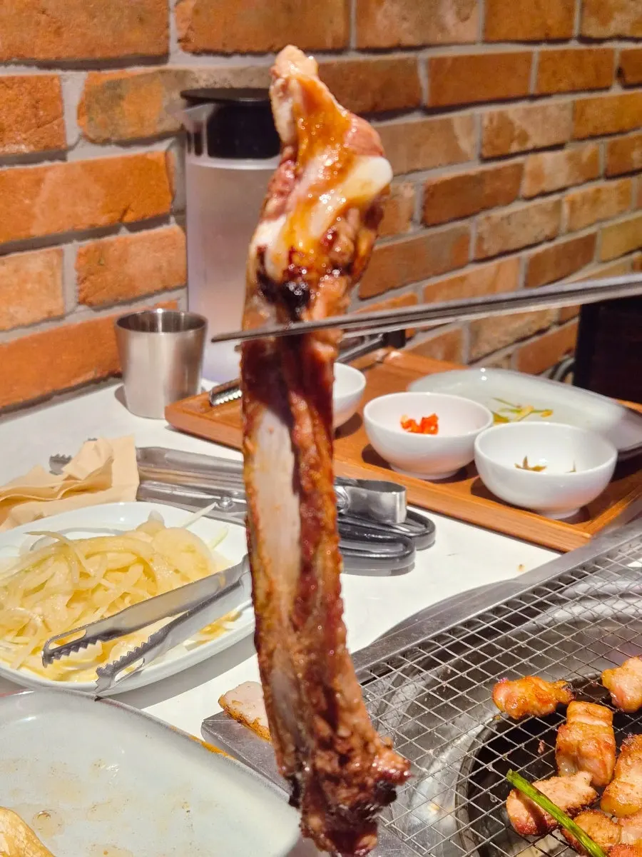 Well-cooked meat with side dishes