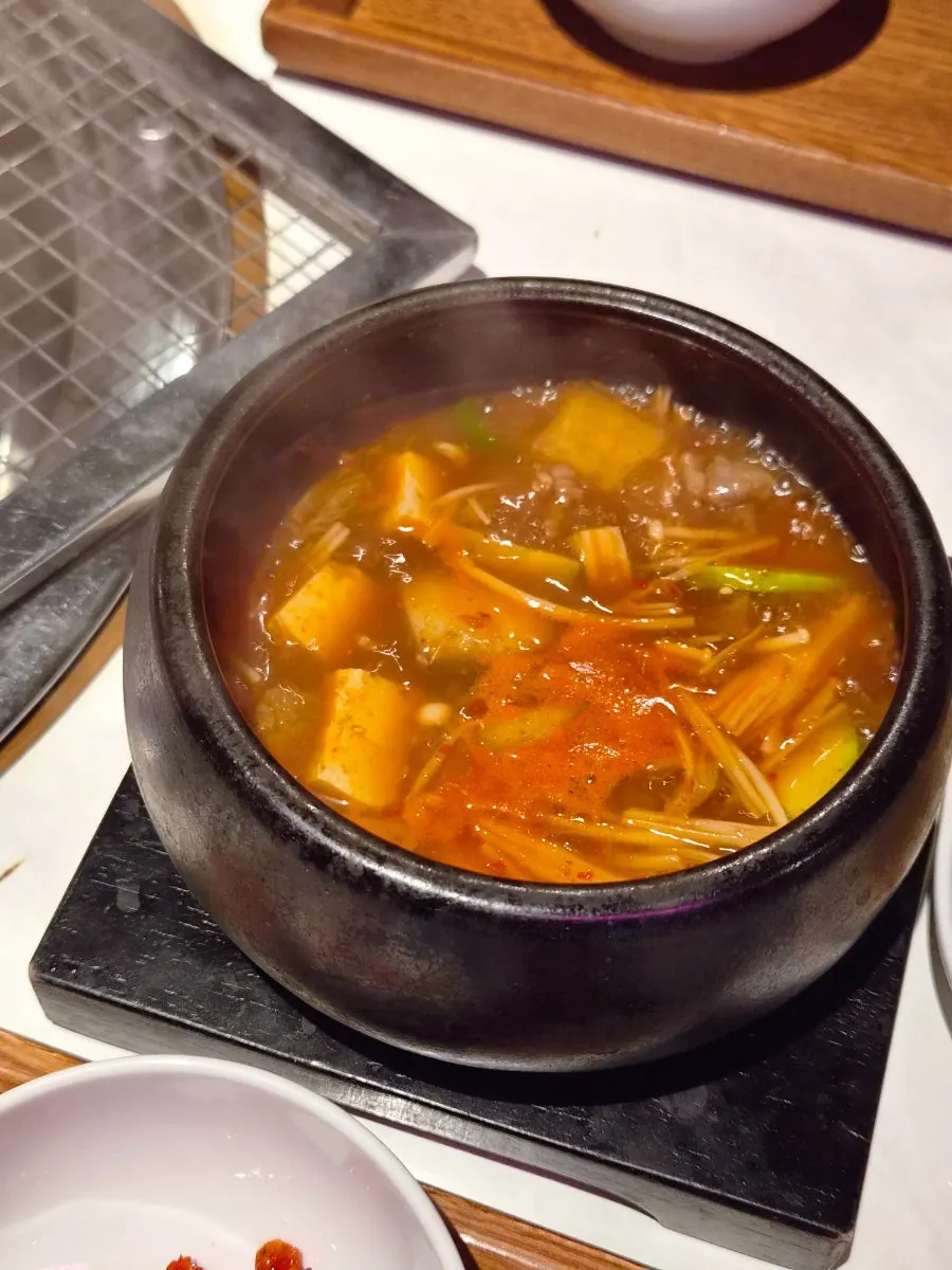 Hanwoo doenjang stew included with the set, in a stone pot