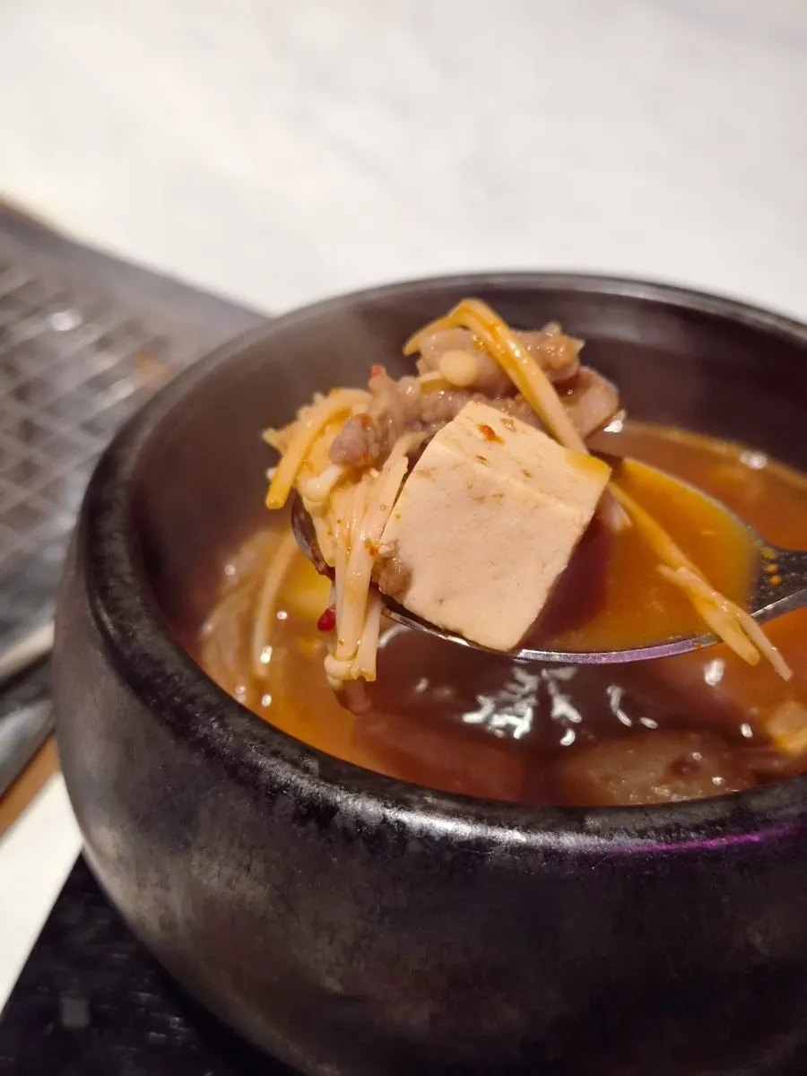 Full spread of meat and doenjang stew