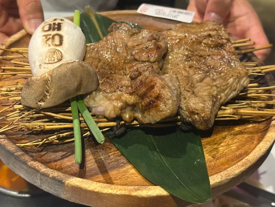 Plate of fully grilled pork set meat
