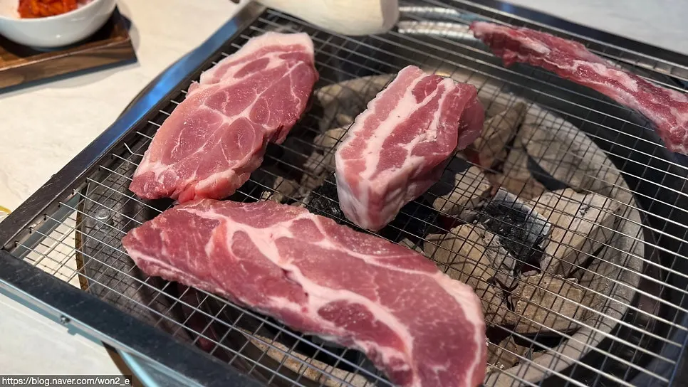 Plate of raw pork cuts from the set