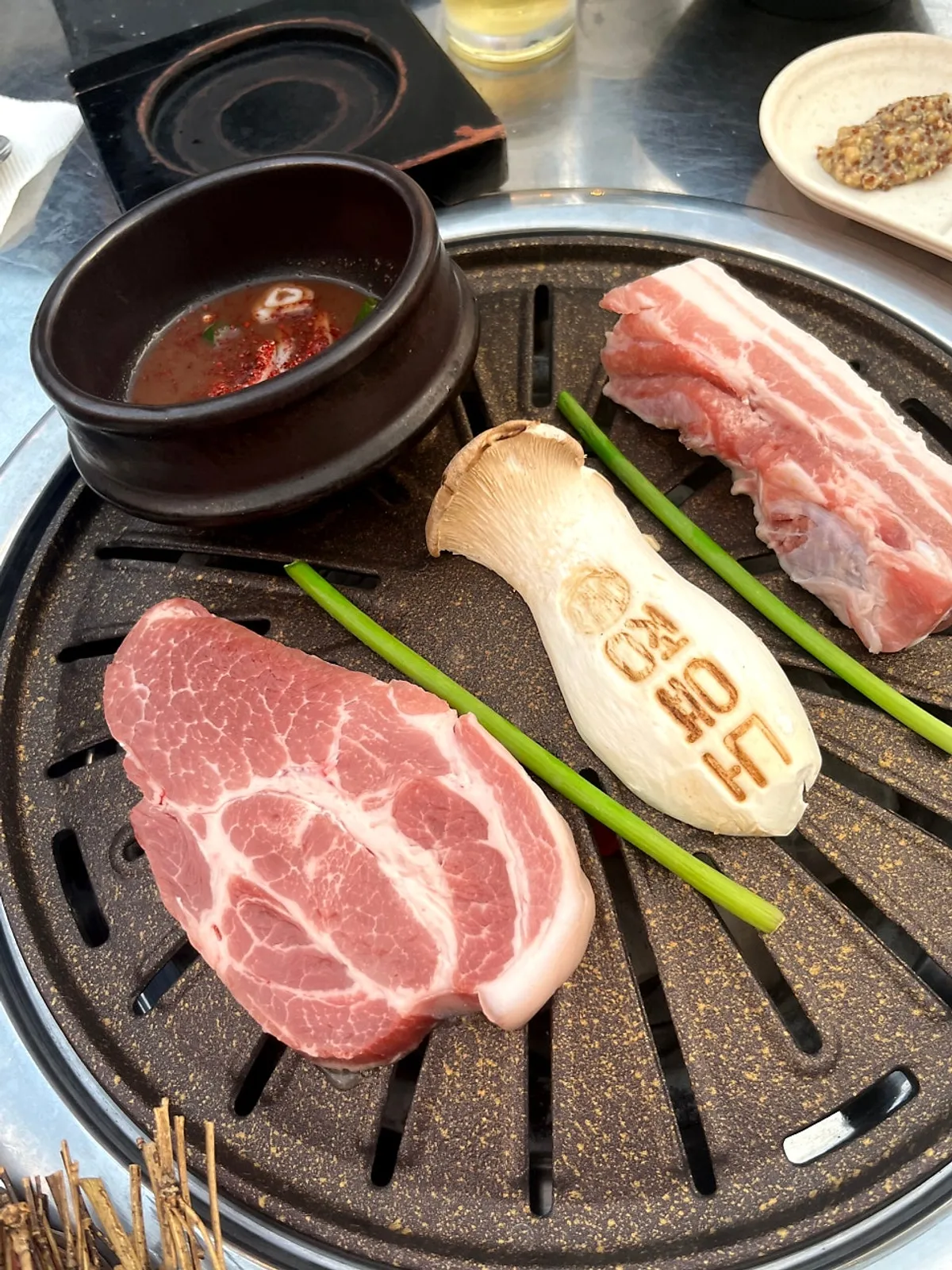 Plate of raw pork for Jeongyukdo's pork set with meljeot dip