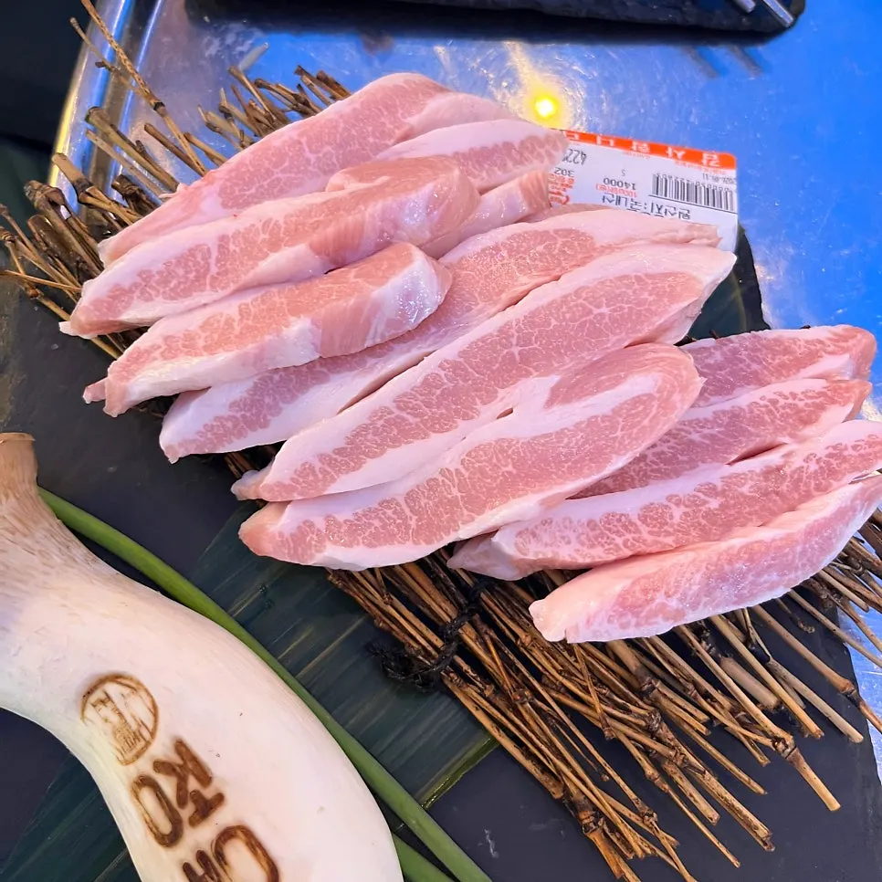 The grill nearly cleared of the pork set's raw short rib