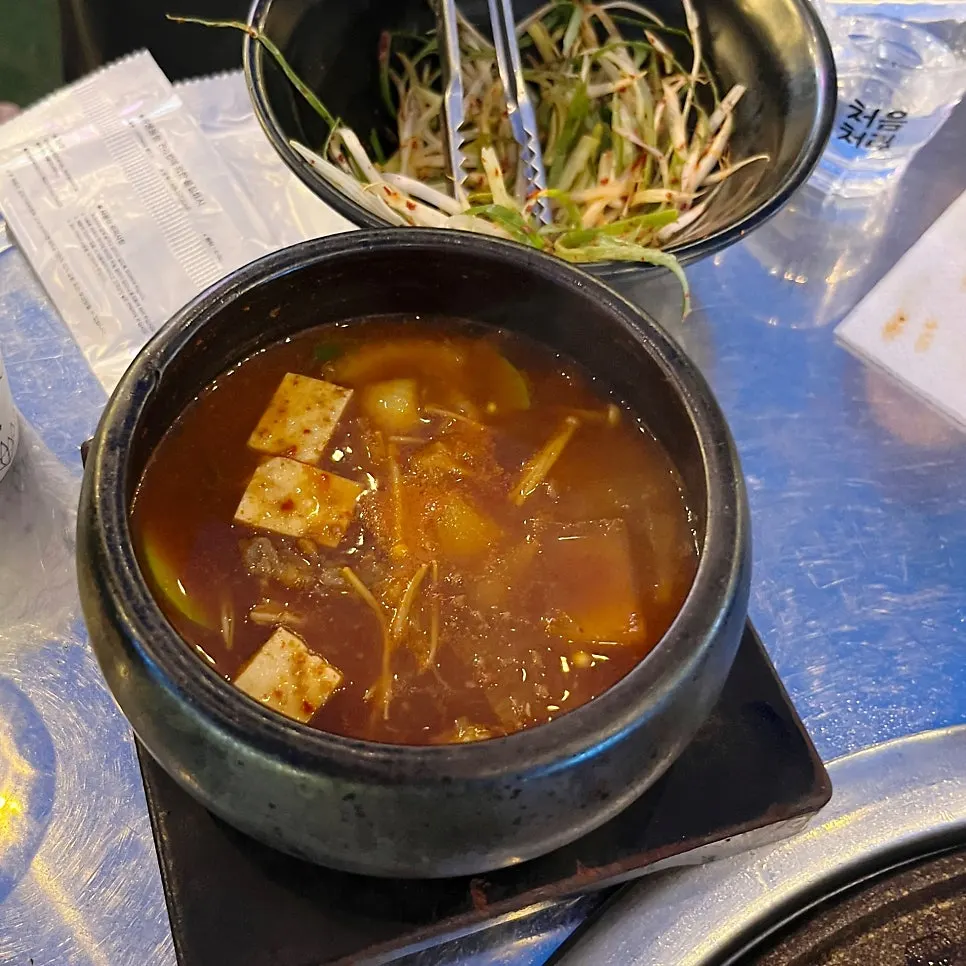 Table with grilled meat before ordering the meal course
