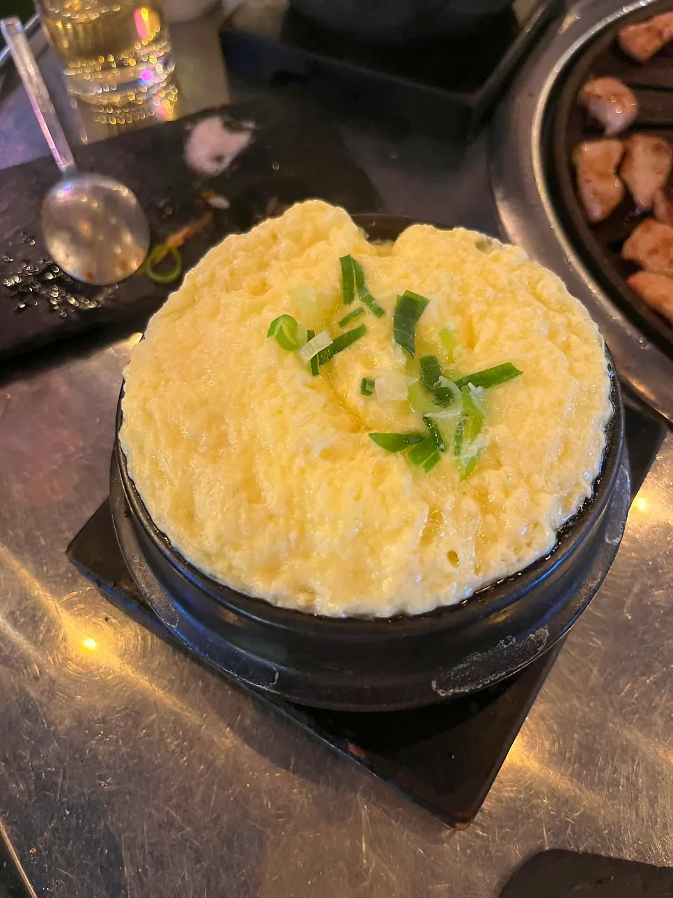 Doenjang stew eaten with a bowl of steamed rice mixed in