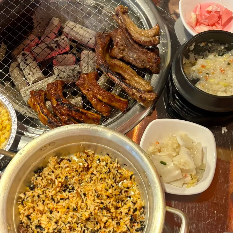 One serving each of soy and seasoned pork ribs on the charcoal grill