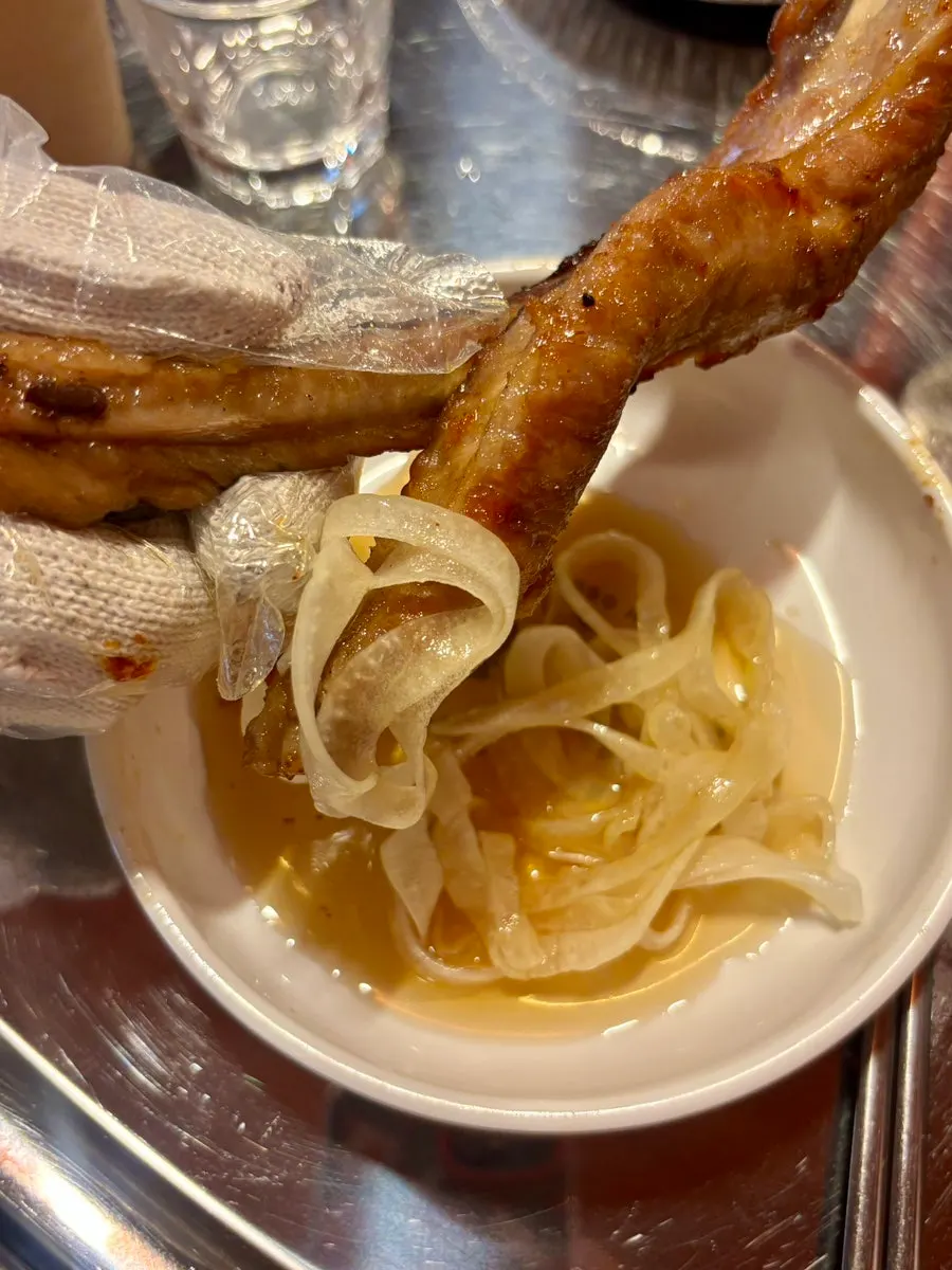 Soy pork rib bone with meat attached