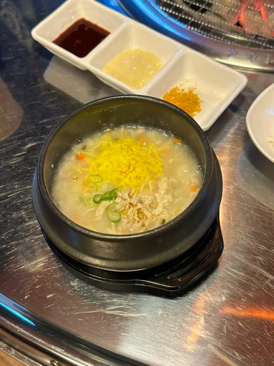Table spread of basic side dishes at Champpoppo Jjokgalbi