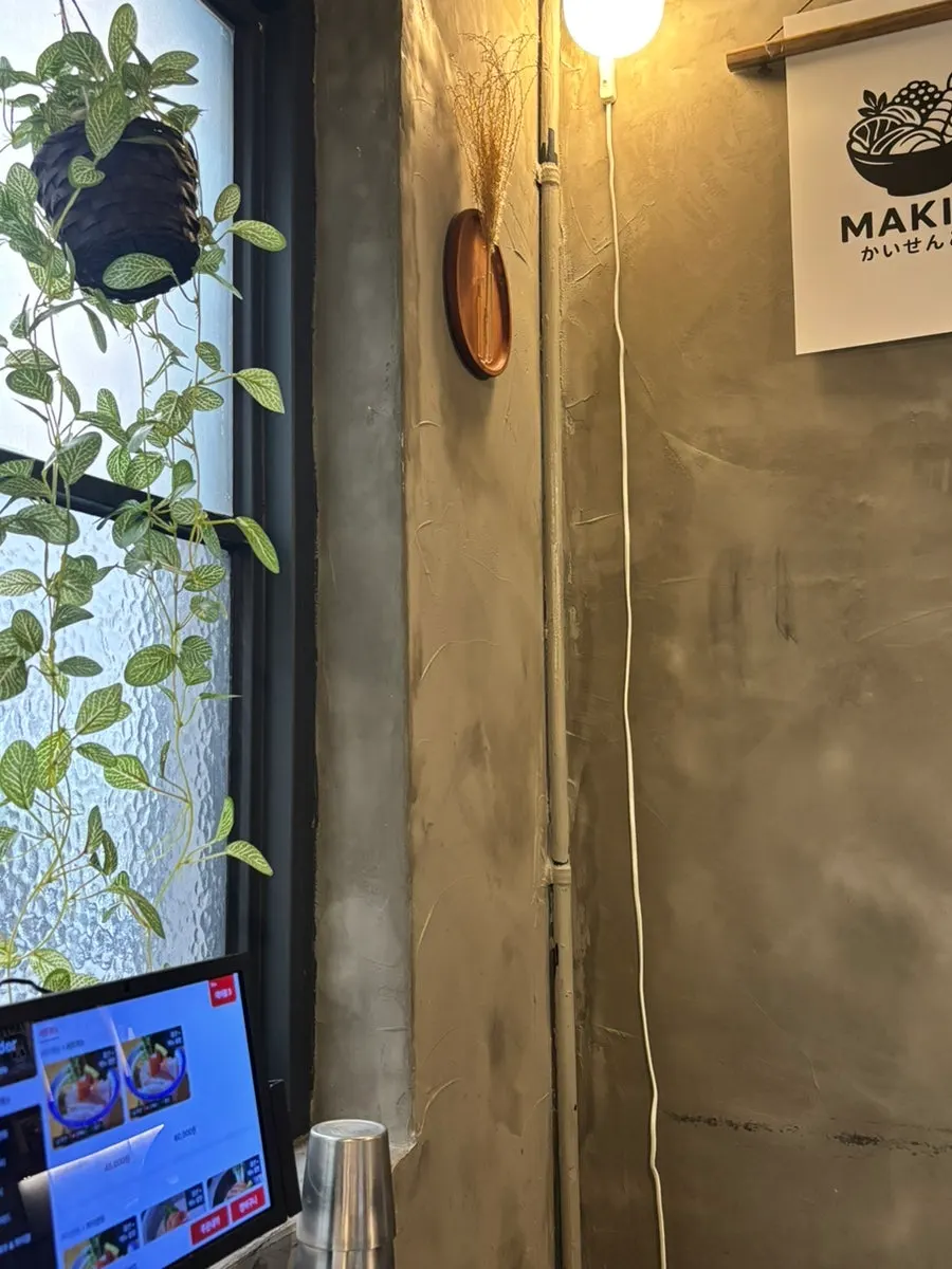 Posters and lighting inside the restaurant