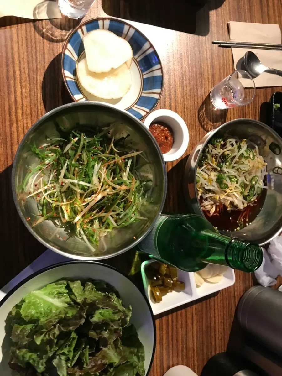 Meat side dishes with pickled mung bean sprouts and seasoned scallions