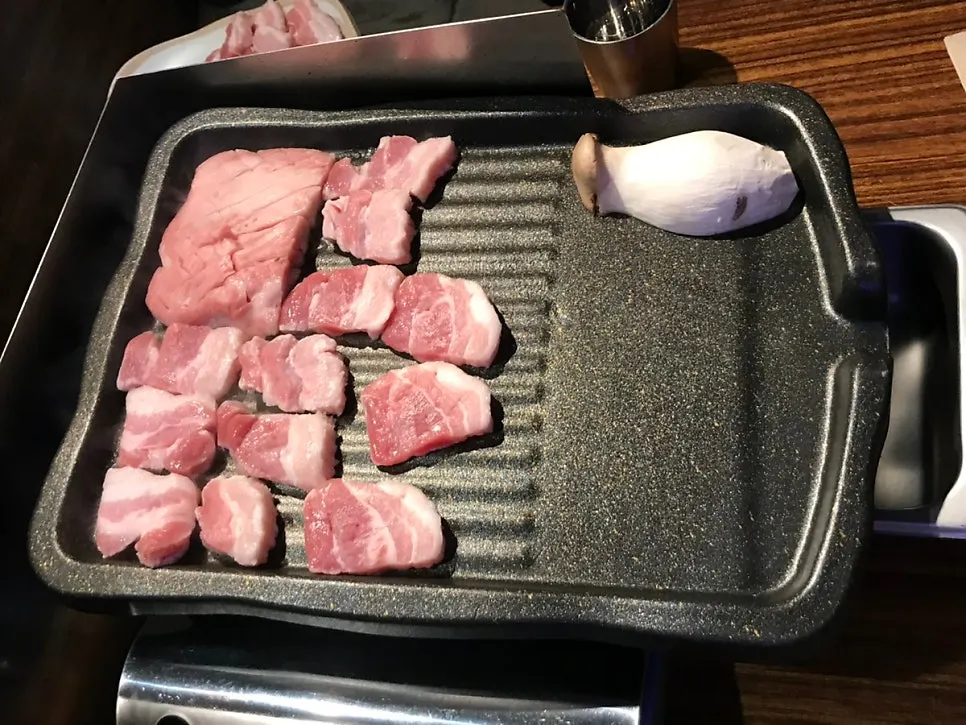 Wasabi and salt served with pork belly