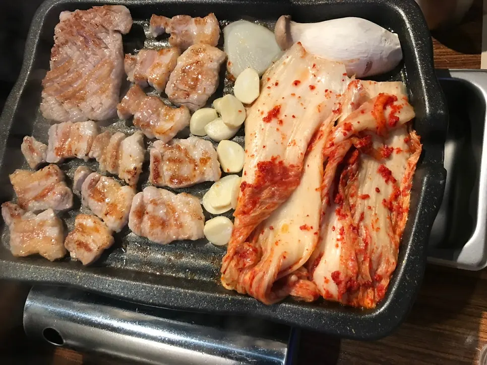 A generous amount of kimchi taken from a container