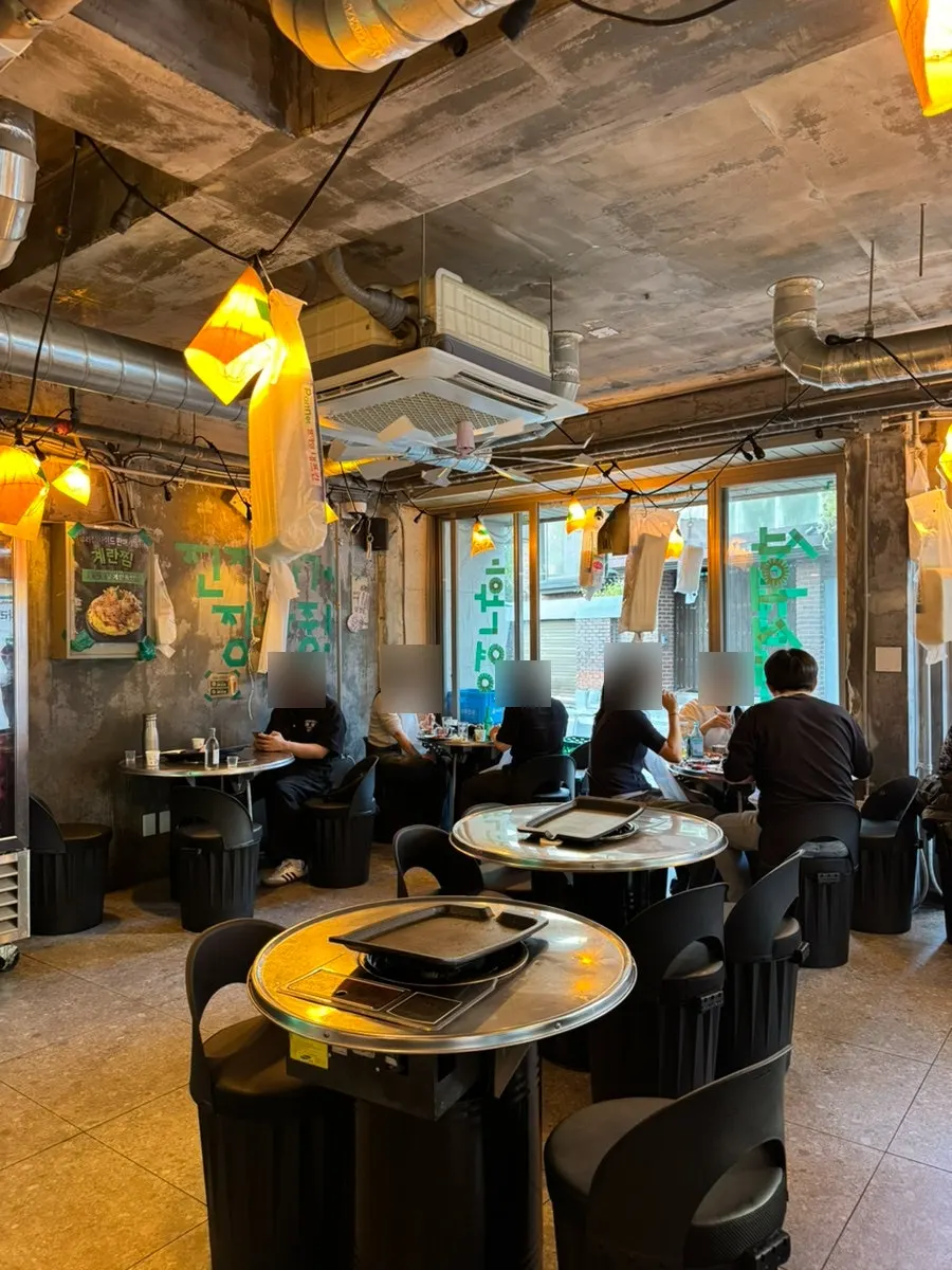 Retro-toned interior seating at Gim Sukseong Hapjeong Branch
