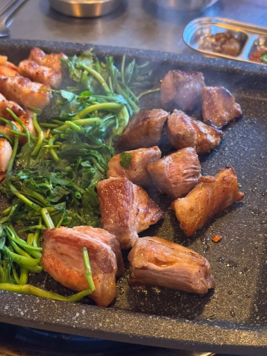 Thickly sliced grilled aged pork