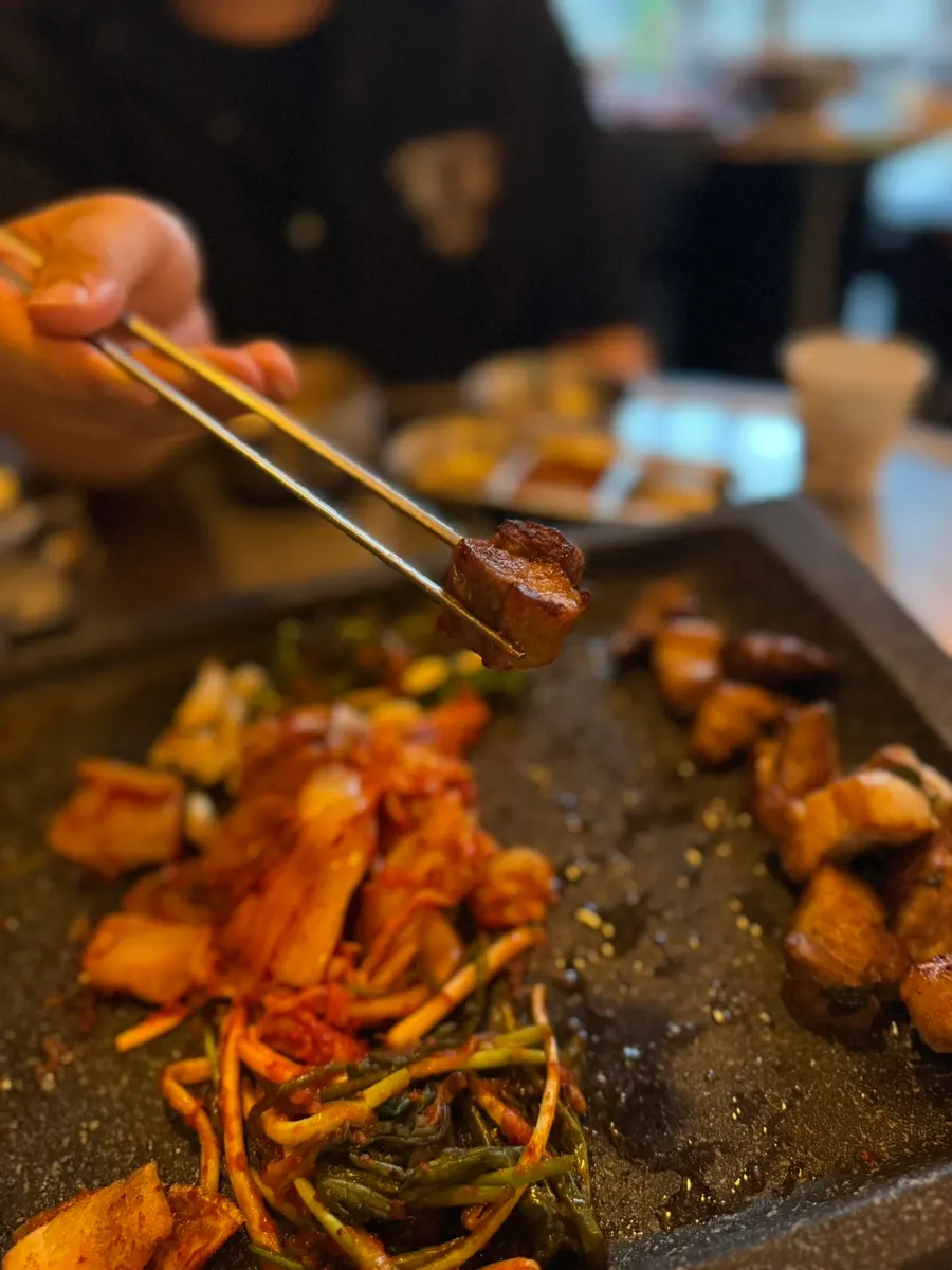 A moist, tender piece of grilled pork neck