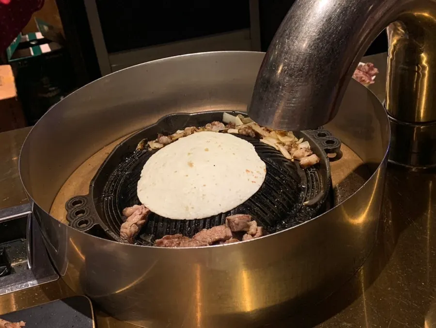 Tortilla grilling over the charcoal