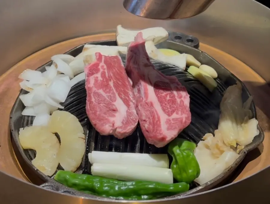 Lamb charcoal-grill table setting at Gukjeyangsik near Hapjeong Station