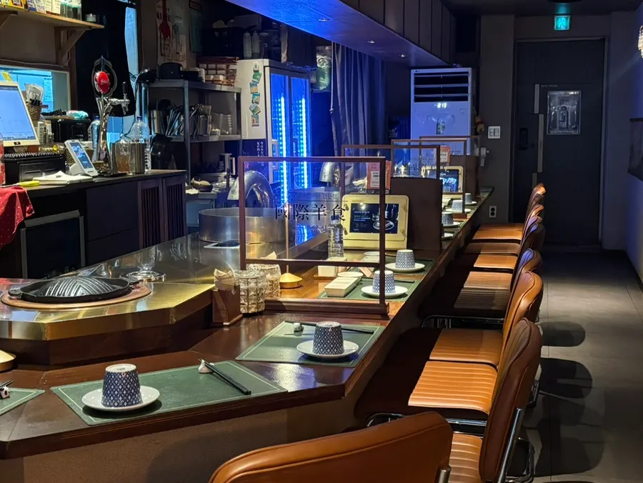 Two-person bar table seating at Gukjeyangsik