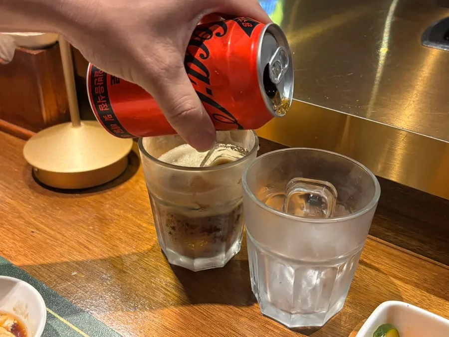 Zero-sugar cola served alongside the lamb chops