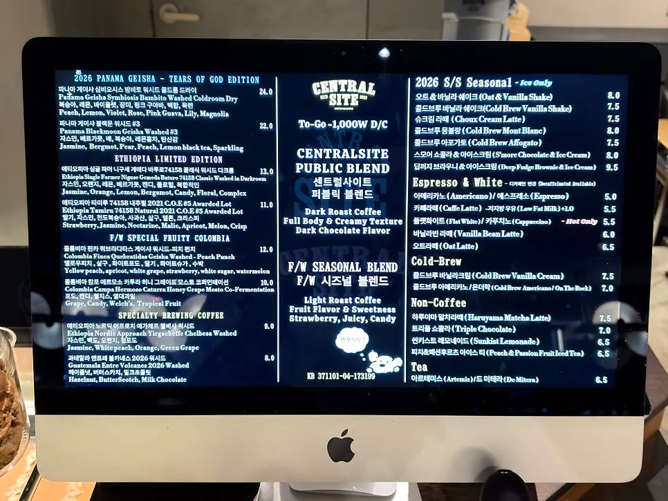 Café menu board listing hand-drip beans