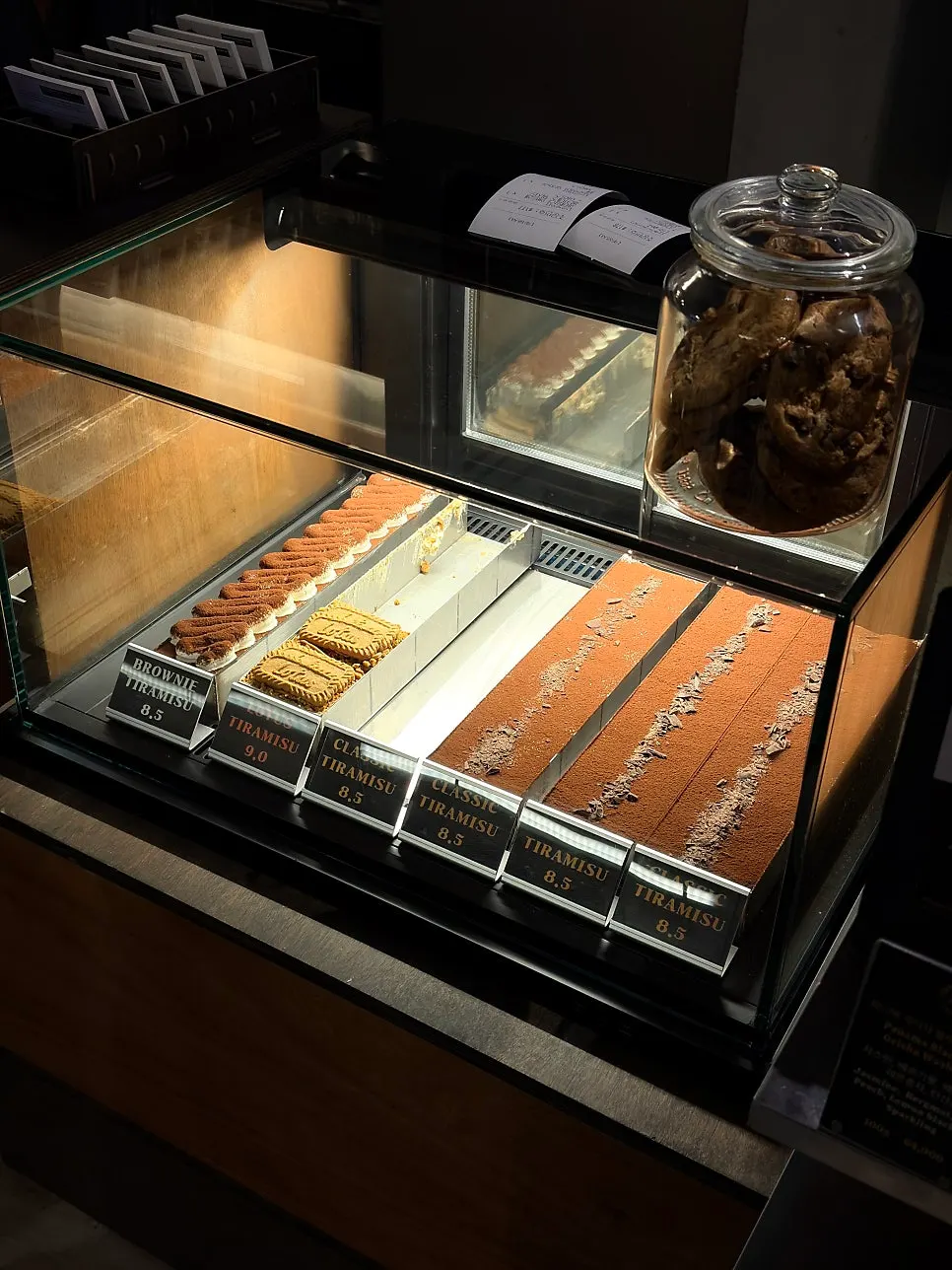 Showcase displaying classic, lotus, and brownie tiramisu