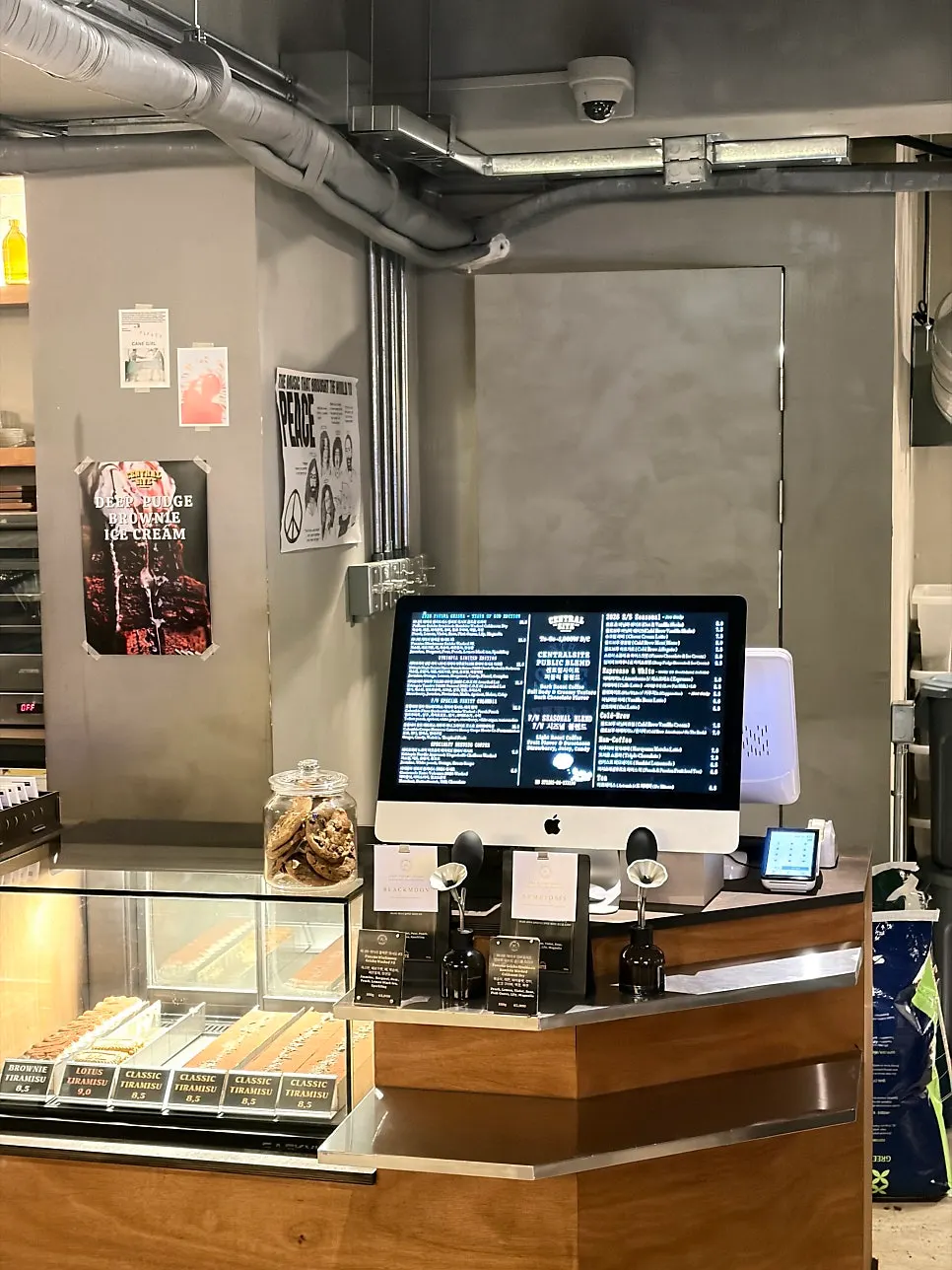 Roasting area visible behind the counter