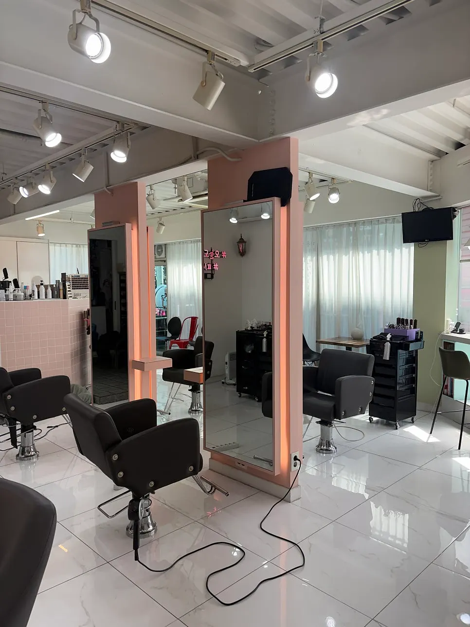 White-toned space at Pieum Hair Hapjeong Main Branch