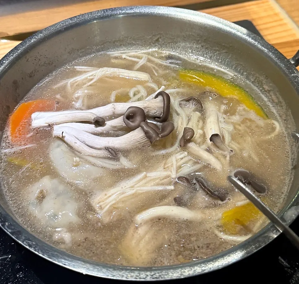 Clear broth with mushroom noodles and kalguksu