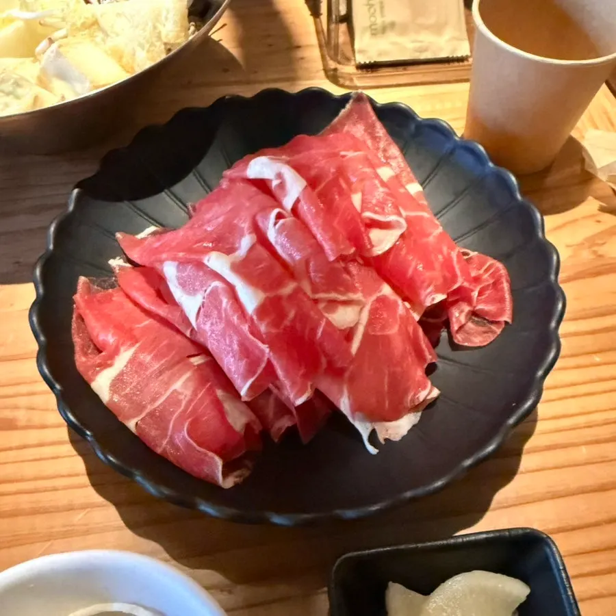 Plate of dumplings and tofu for shabu-shabu