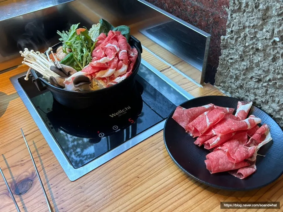 Hon Special Sukiyaki spread with mushrooms, konjac, tofu, and vegetables