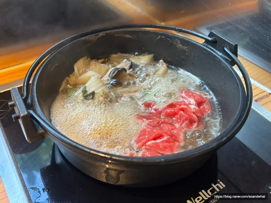 Sukiyaki pot bubbling in the electric kettle