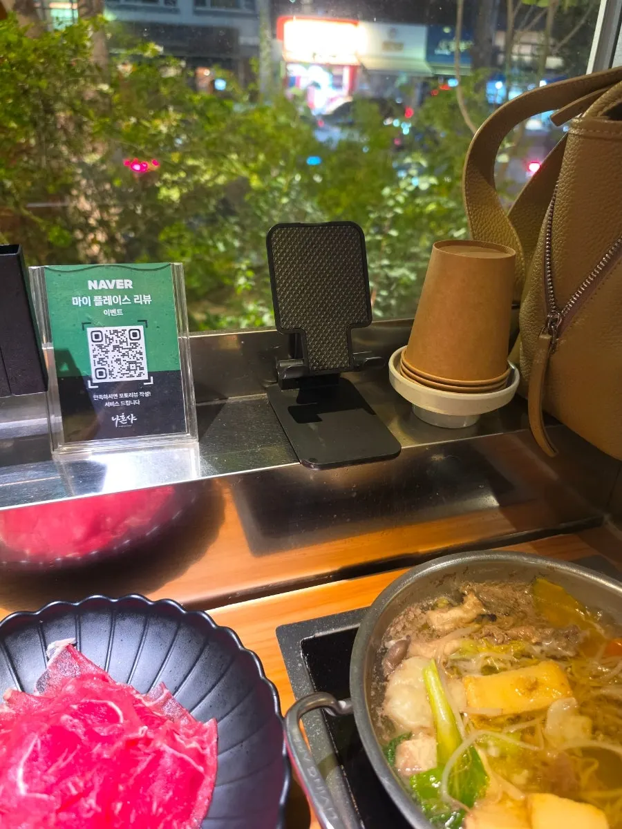 Phone stand set up at the single seat