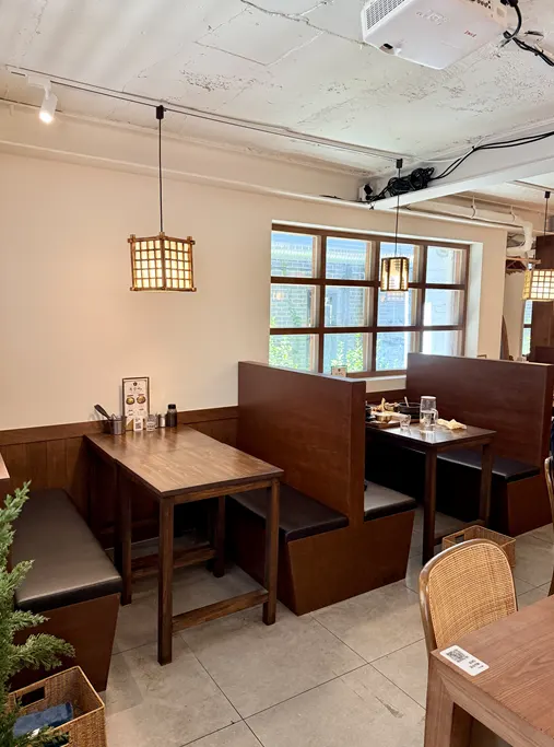 Calm wood-toned interior of Ok Galbi