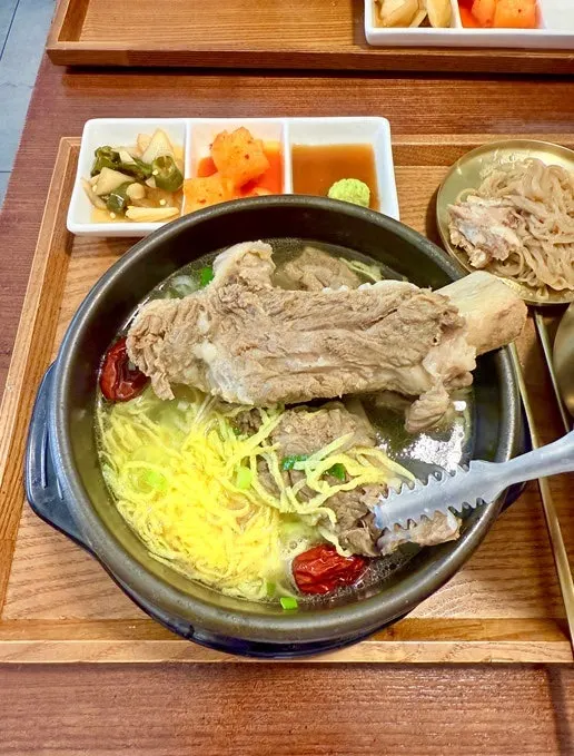 Galbitang topped with ribs and egg garnish