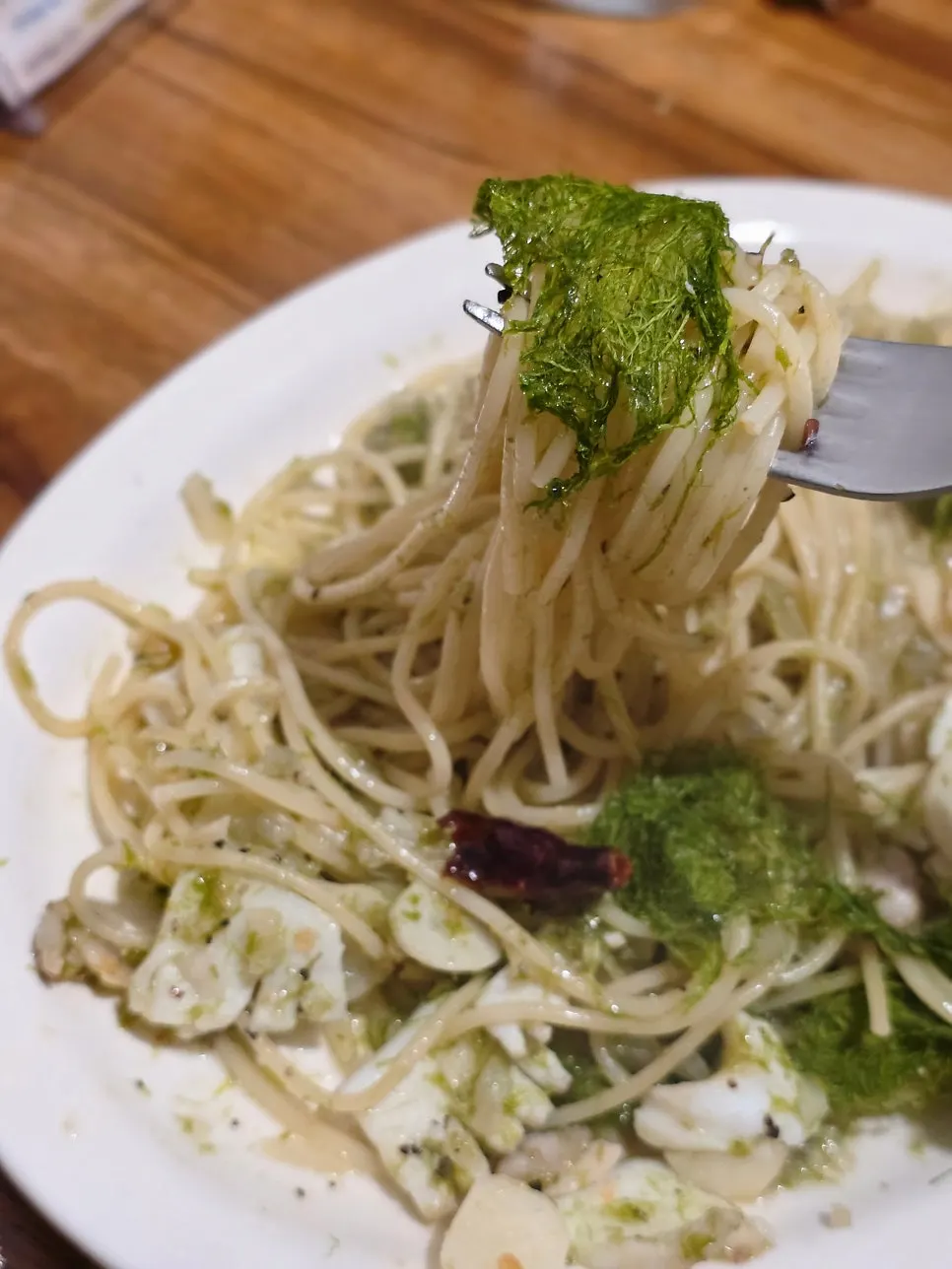 Vongole pasta topped generously with gamtae