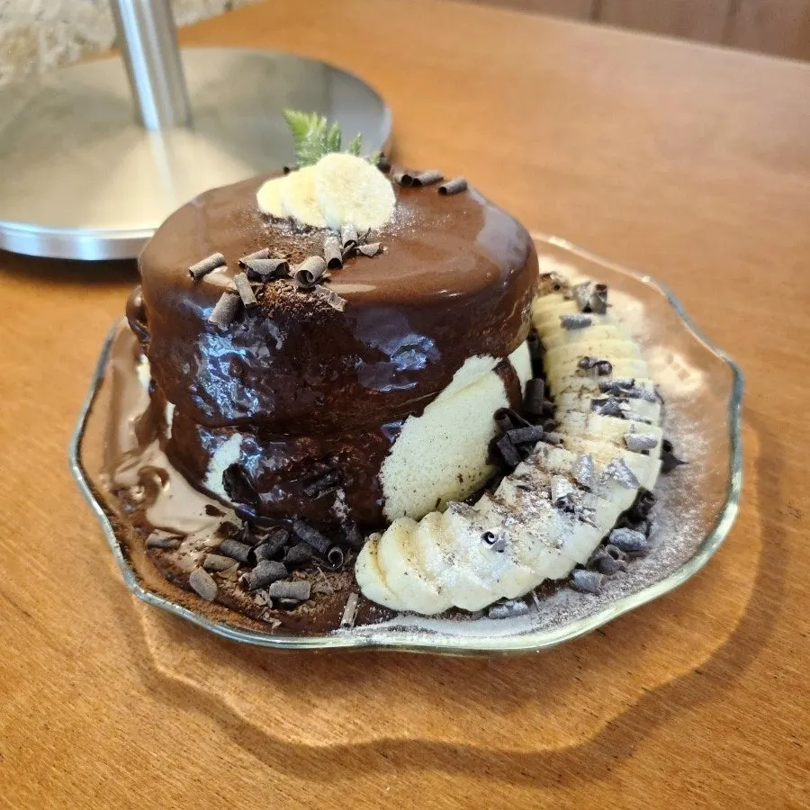 Chocolate banana soufflé topped generously with chocolate