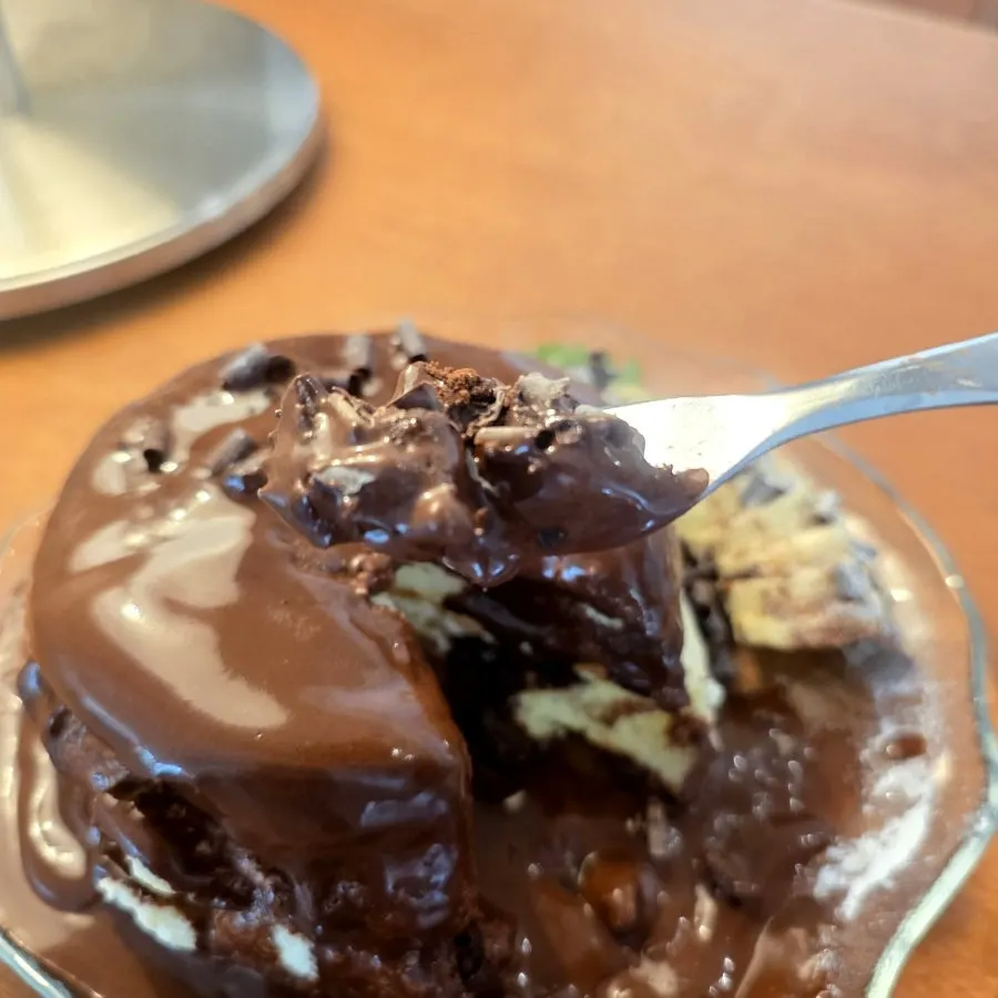 Taking a bite of chocolate banana soufflé