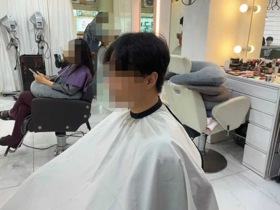 Salon scene during the haircut