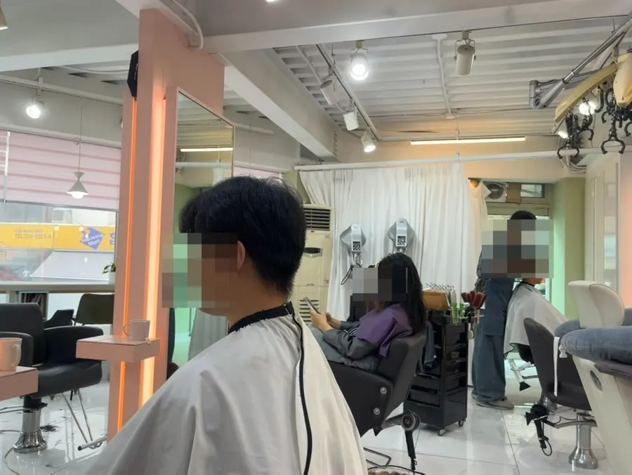 The side down perm treatment in progress
