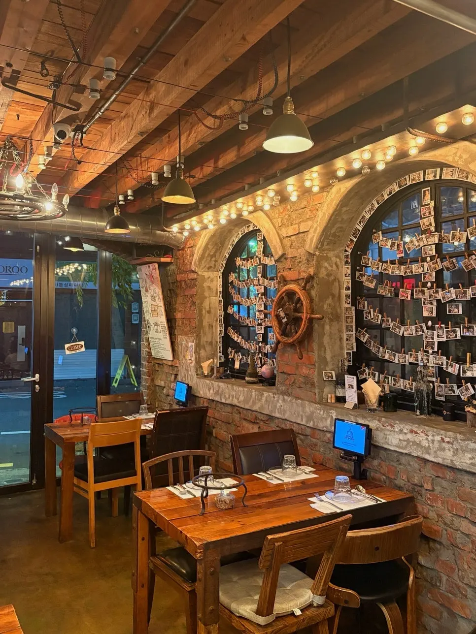 The entrance and alley view of Hongdae Hwadeok Pizza
