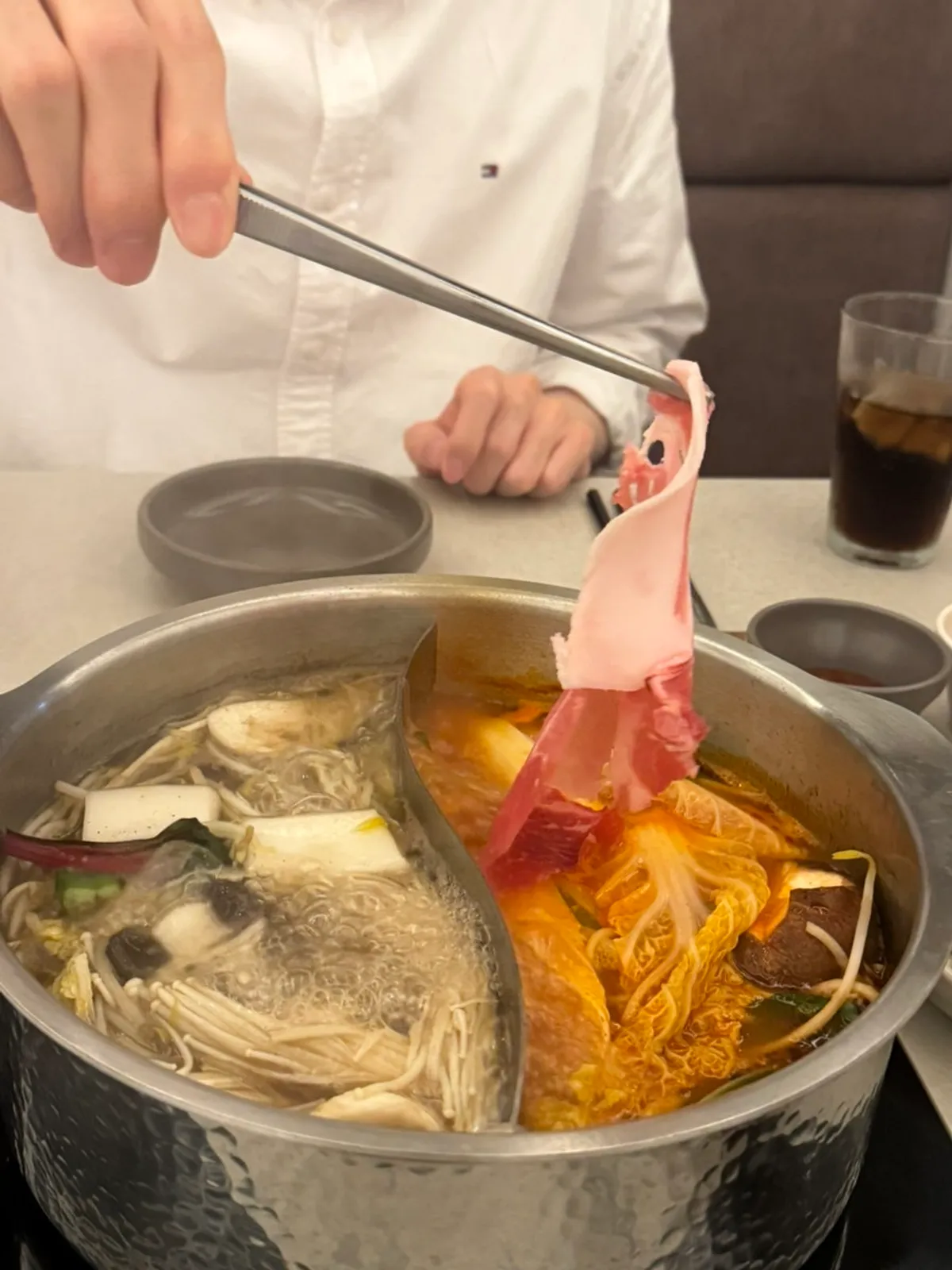 Half-and-half shabu broth boiling away