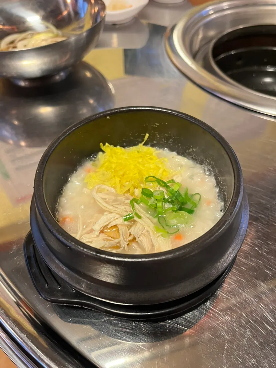 Plate of kaeyonjeu salad next to the jjokgalbi