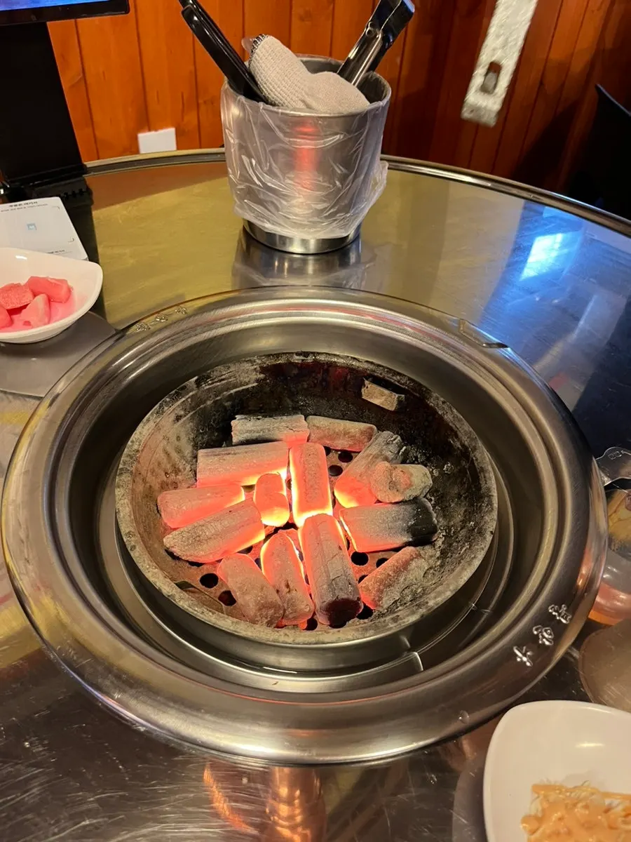 Tabletop grill ready for cooking meat