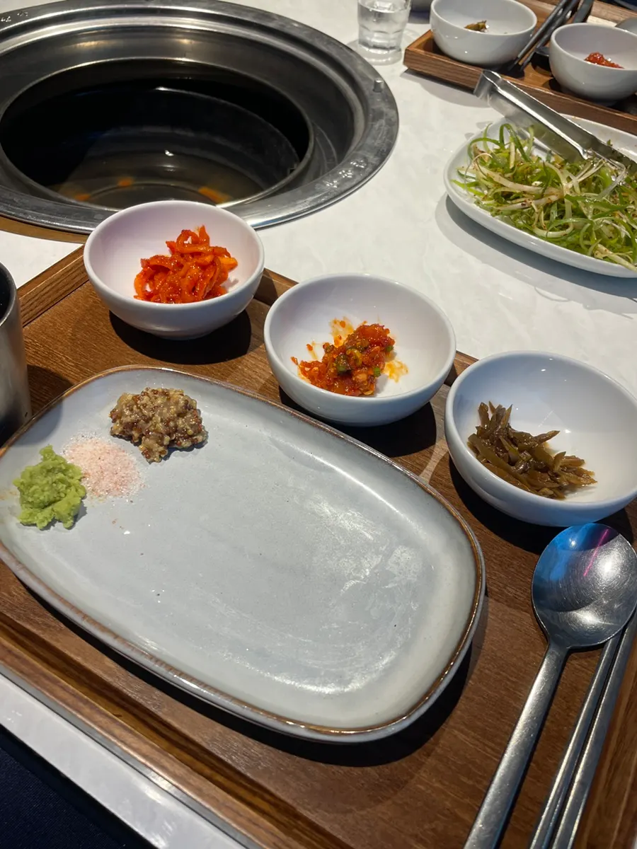 Basic side dishes including pickled chili peppers and seasoned shredded radish