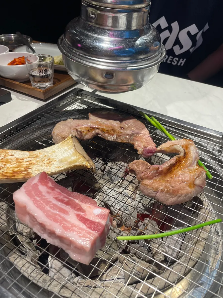 Korean pork set being grilled