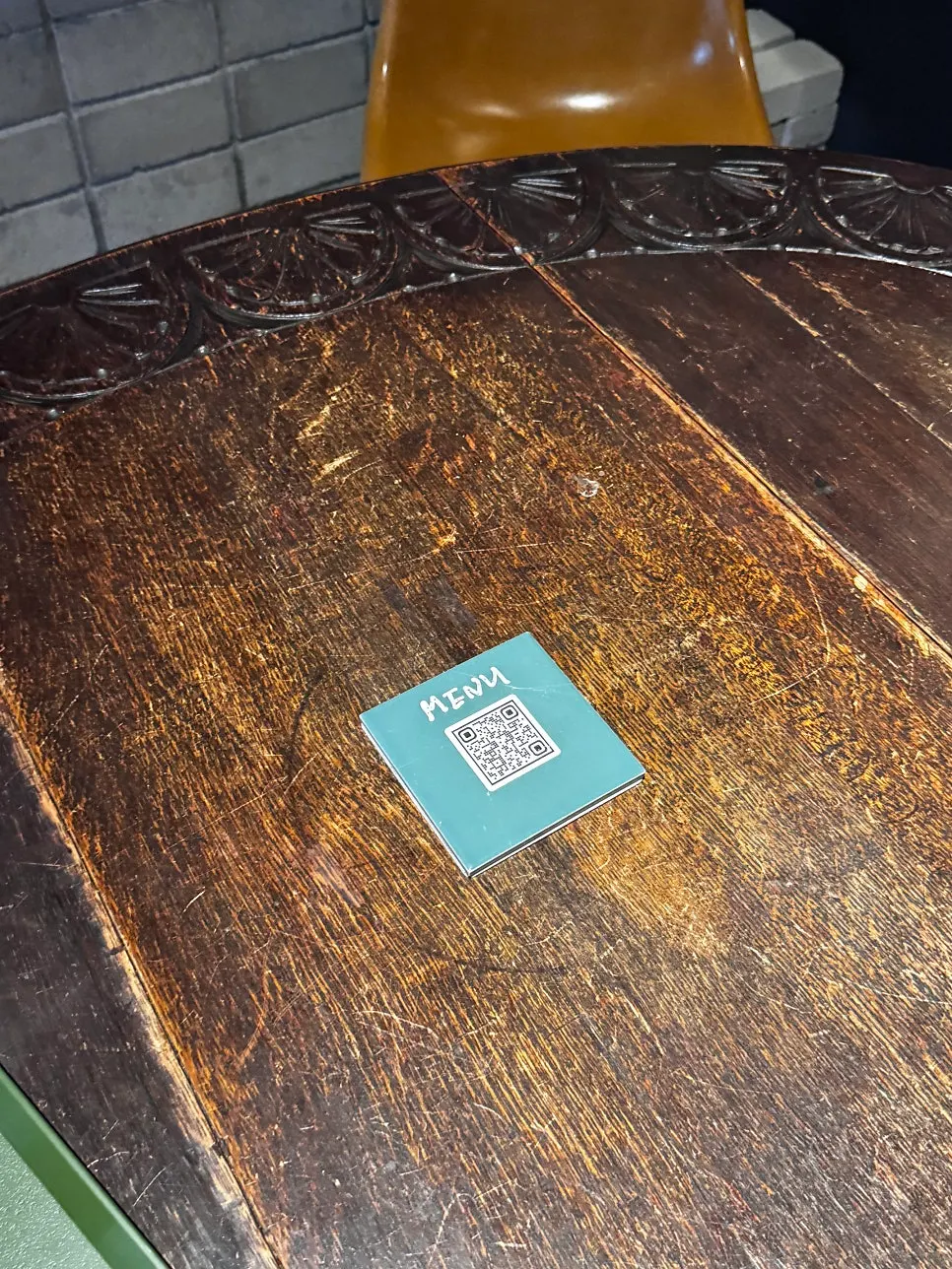 Seowon Angil menu QR code on a table