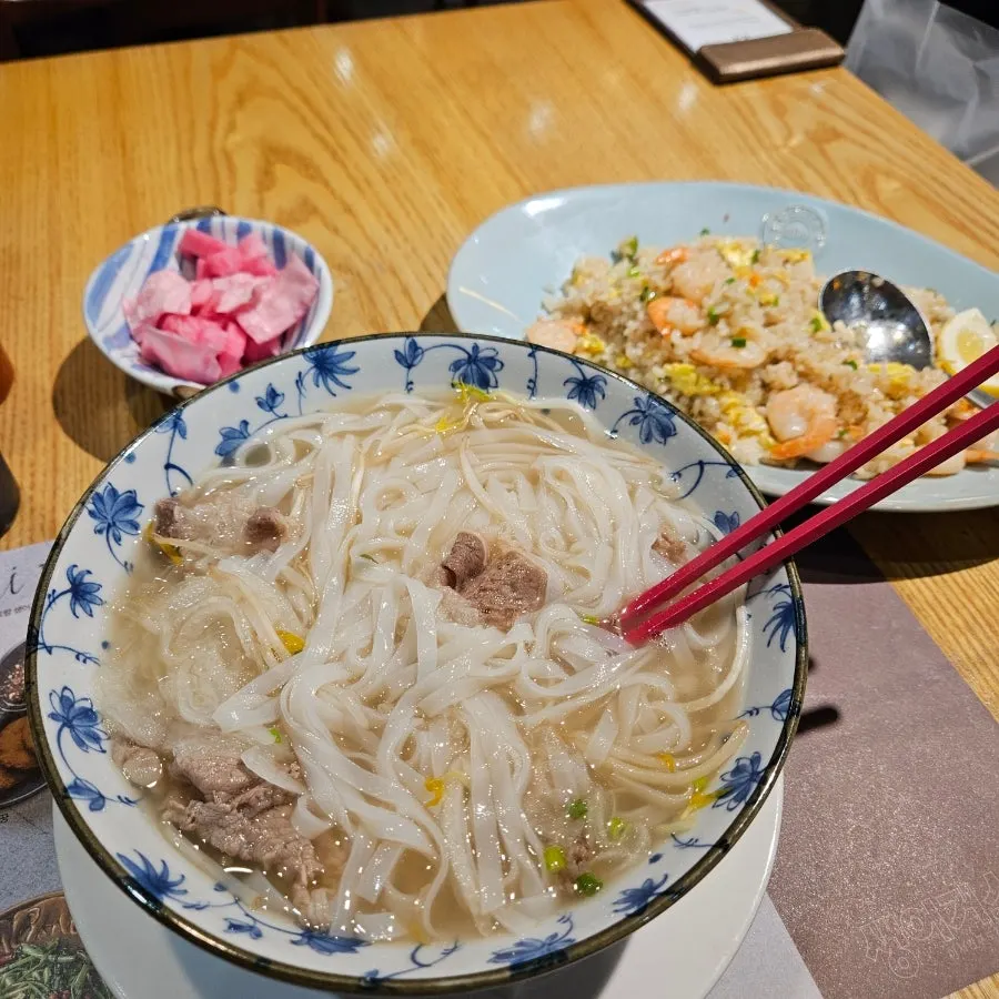 Cabbage pickles and radish pickles served alongside