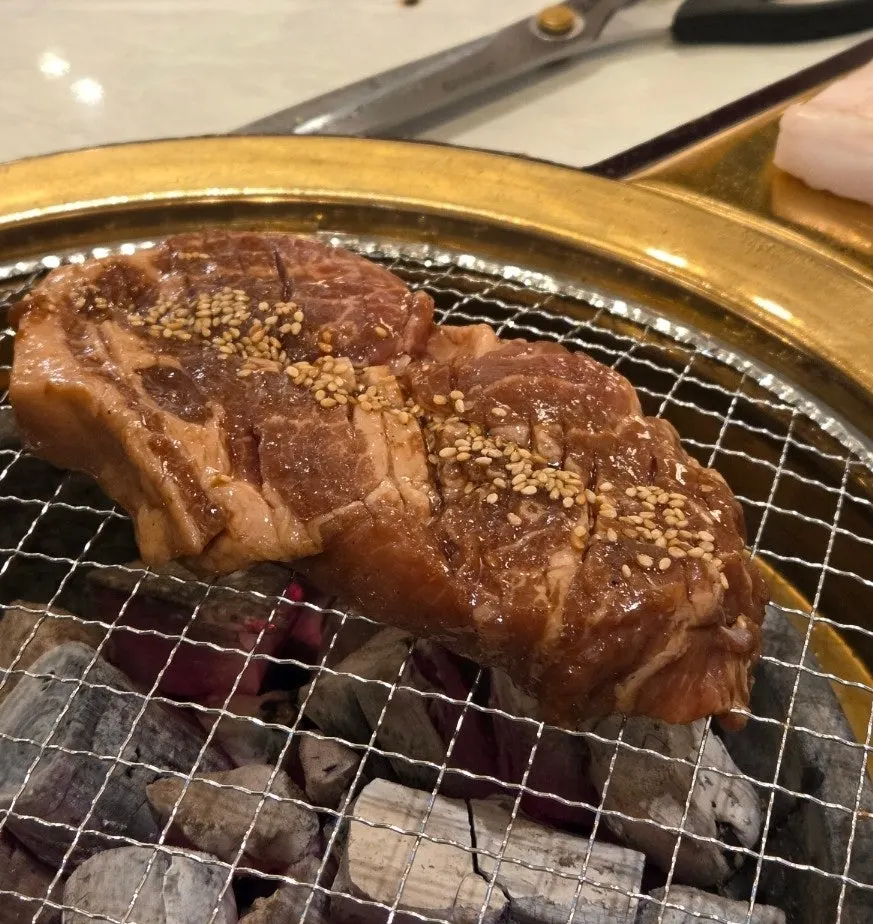 Pork neck galbi on the grill