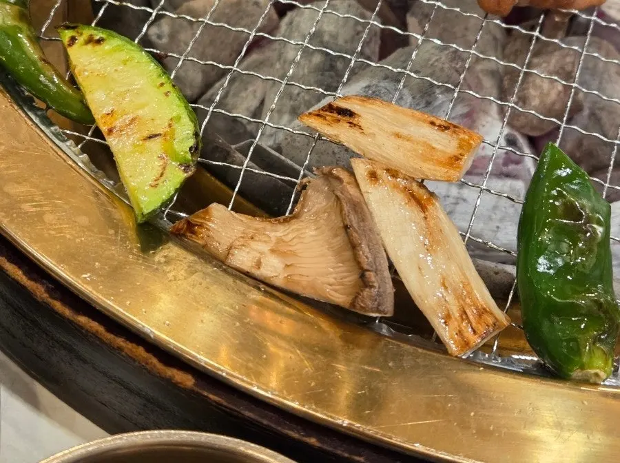 Seasoned pork galbi served with side dishes