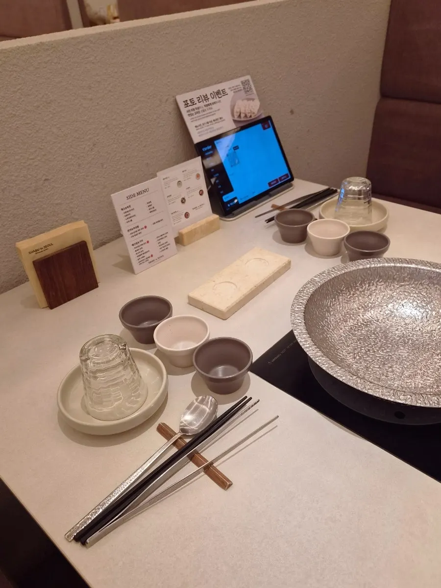 Spaciously arranged tables and seating at Shabu in Seoul Hapjeong Branch